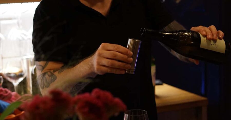 6-Tier Hungarian Wine Tasting at a Cozy Community Table - Practical timing and booking advice