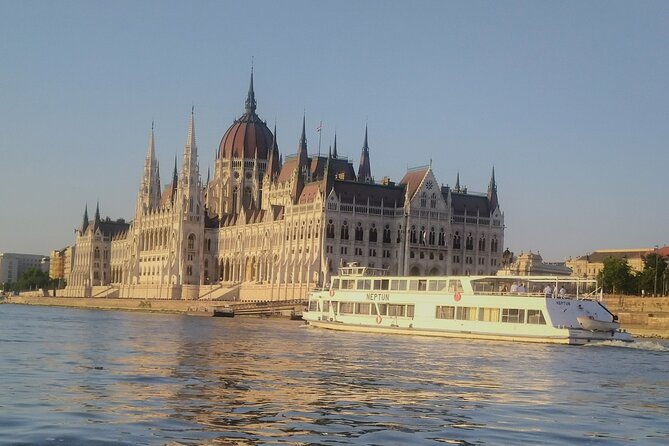 Budapest: 1-Hour Highlights Cruise with Welcome Drink - Hungarian Parliament Building after dark