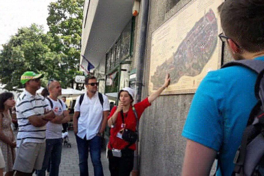 Budapest: Buda Castle District Walking Tour - Medieval walls and views toward the Buda Hills