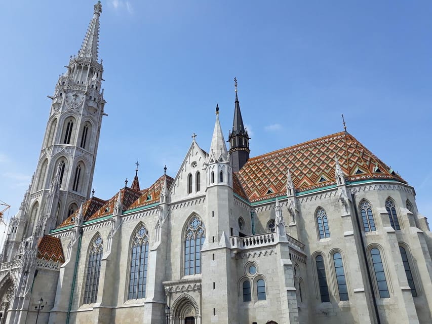 Budapest: Buda Castle Walking Tour & Folk Music Performance - Meeting at Holy Trinity Square