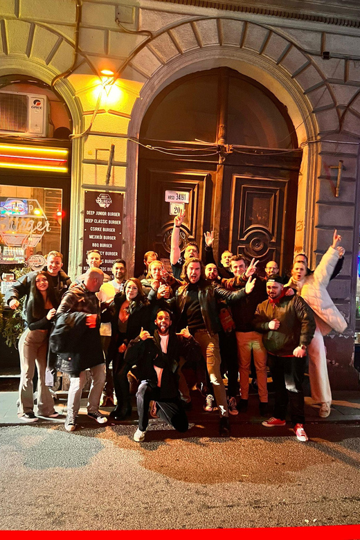 Budapest: Guided Bar Crawl with 1 Hour Open Bar and Shots - Budapest after dark, with a built-in social plan