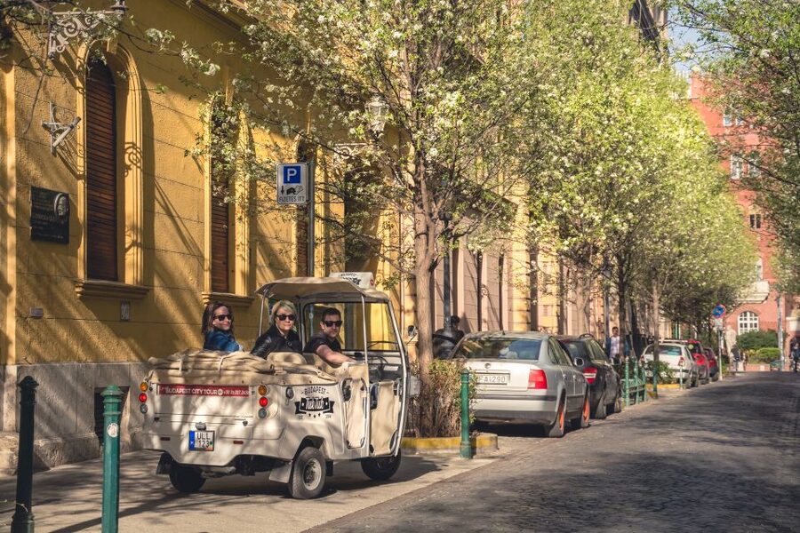 Budapest: Private City Tuk-Tuk Tour & Boat Cruise - Crossing Liberty Bridge toward Gellért Hill