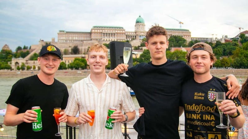 Budapest: Sip & Sail Danube Cruise with Unlimited Beer - The return past Vigadó Concert Hall and Gresham Palace