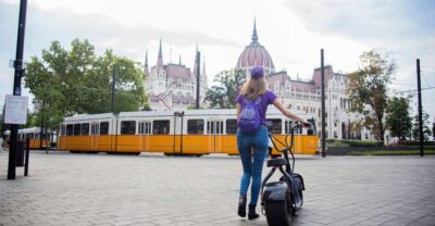 Top sights of Pest downtown on e-scooters incl. Parliament